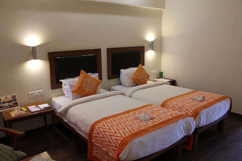 Krishna Inn 콜라푸르 객실 사진