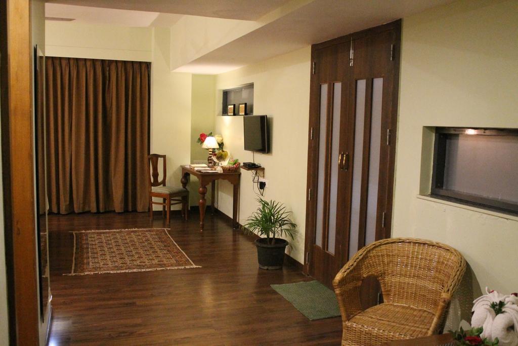 Krishna Inn 콜라푸르 객실 사진
